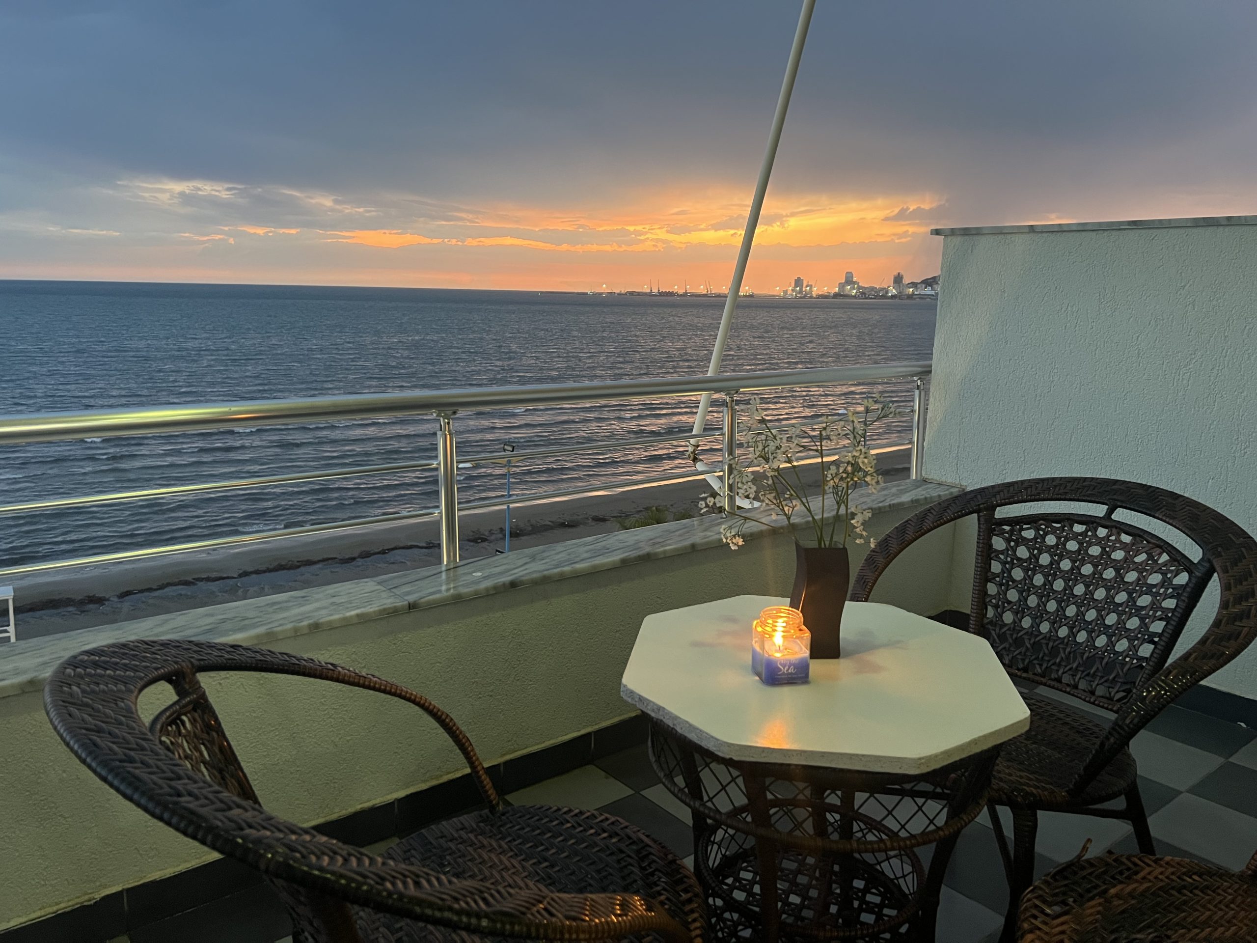 balcony-sea-sunset-view